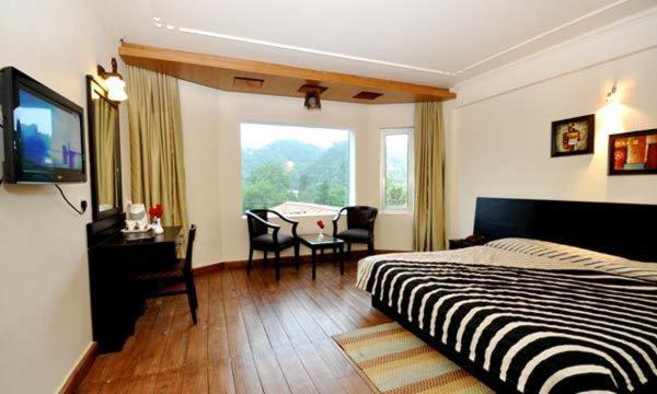 Hotel Suman Paradise Nainital Oda fotoğraf